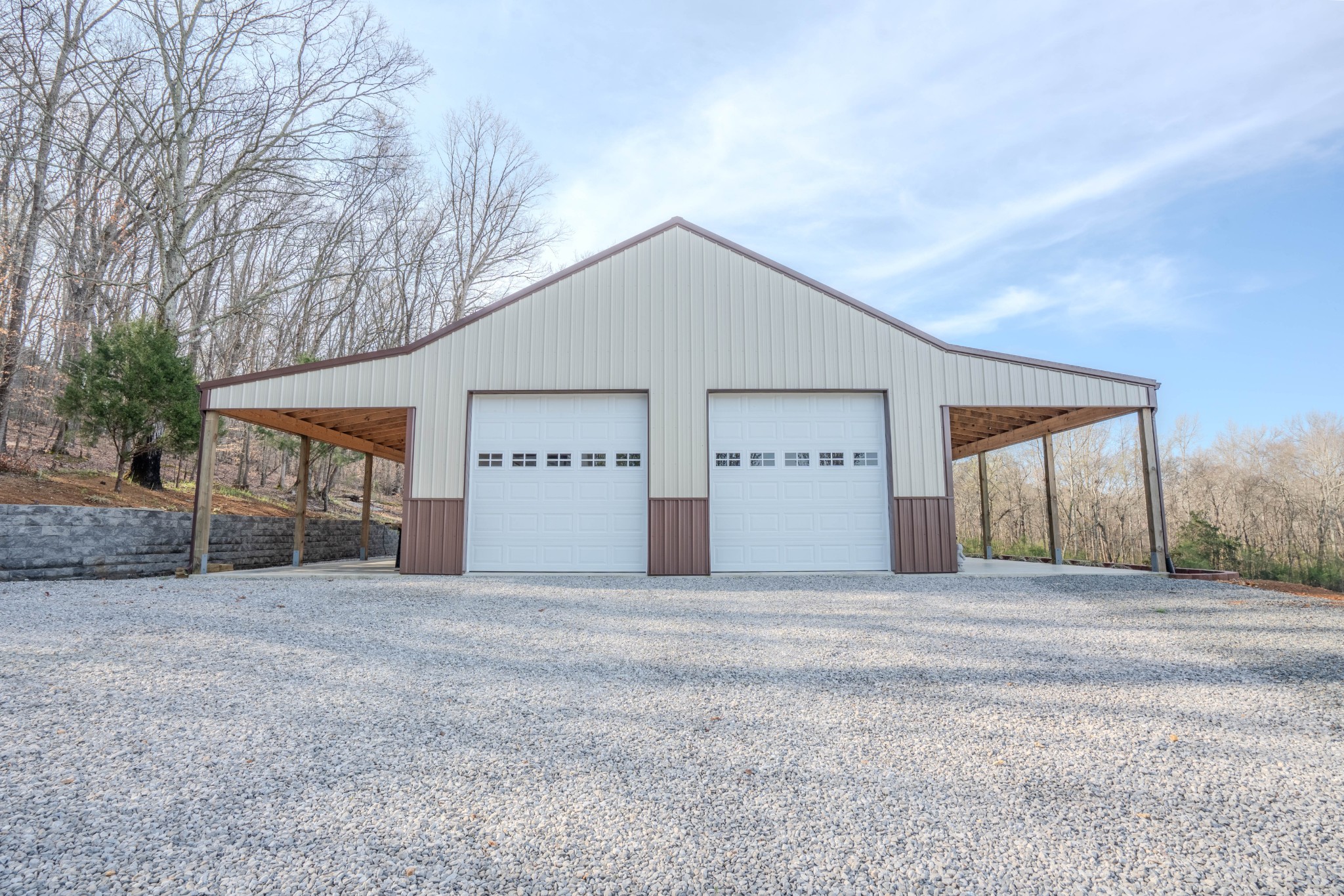109 Rascal Town Road Loretto, TN 38469 - Photo 5 of 43 a large house with a large parking space and a garage