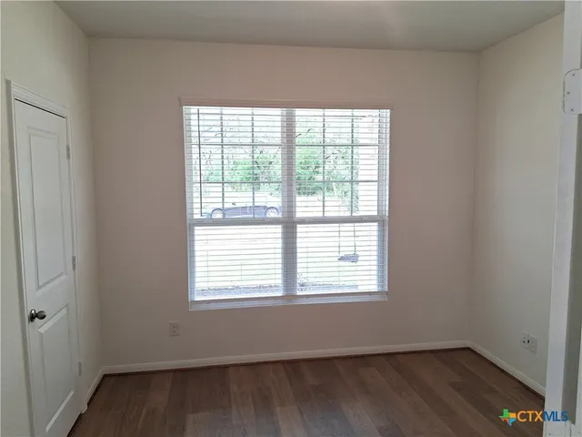 an empty room with a window