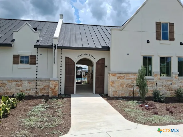 a view of a swimming pool with a lounge chairs