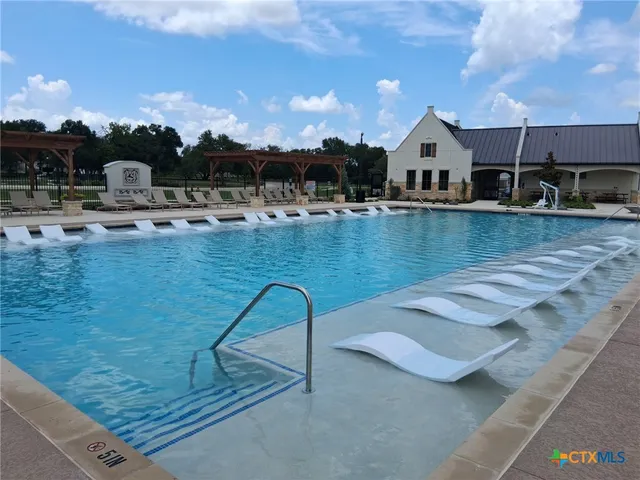 a view of a golf course with a garden