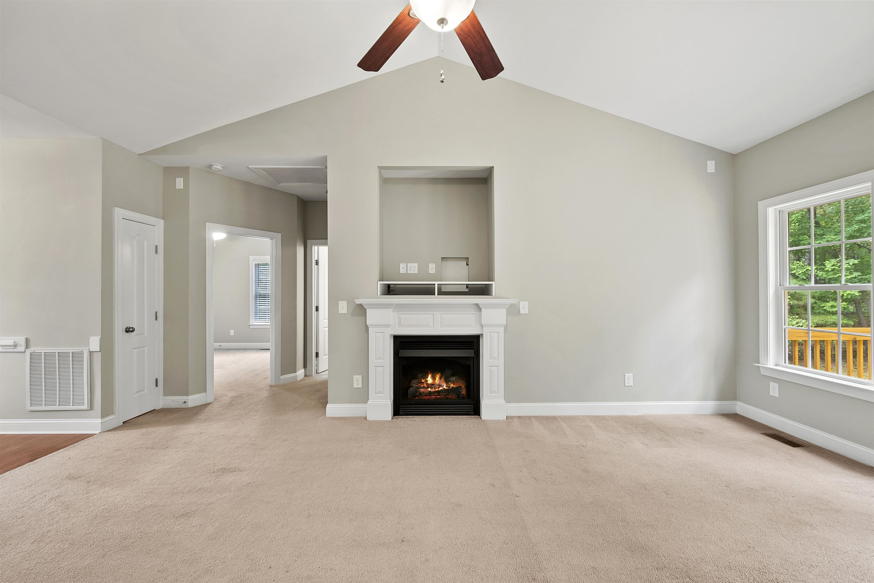 135 Rawhide Drive Spring Hope, NC 27882 - Photo 11 of 34 a view of a livingroom with a fireplace and window