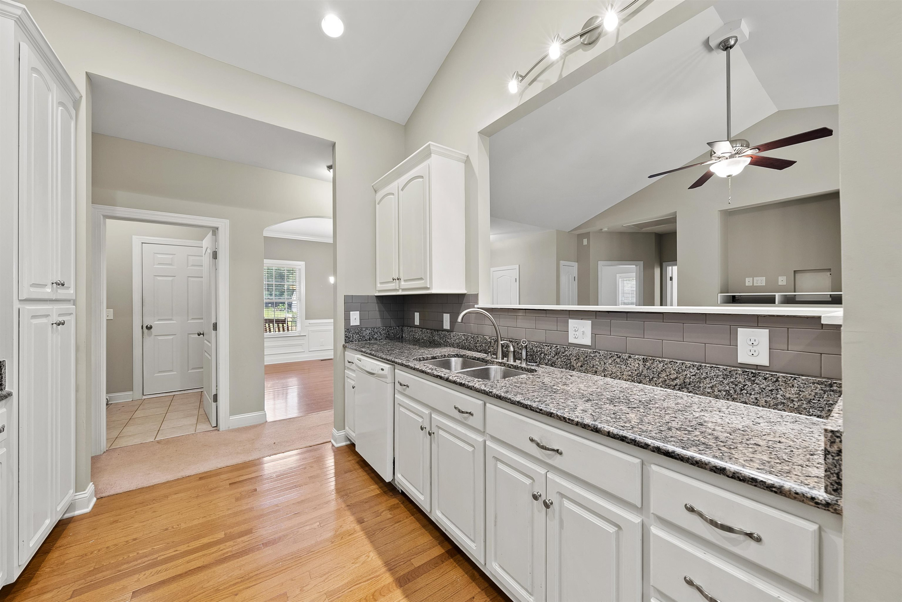 135 Rawhide Drive Spring Hope, NC 27882 - Photo 15 of 34 a spacious bathroom with a granite countertop sink a mirror and a shower