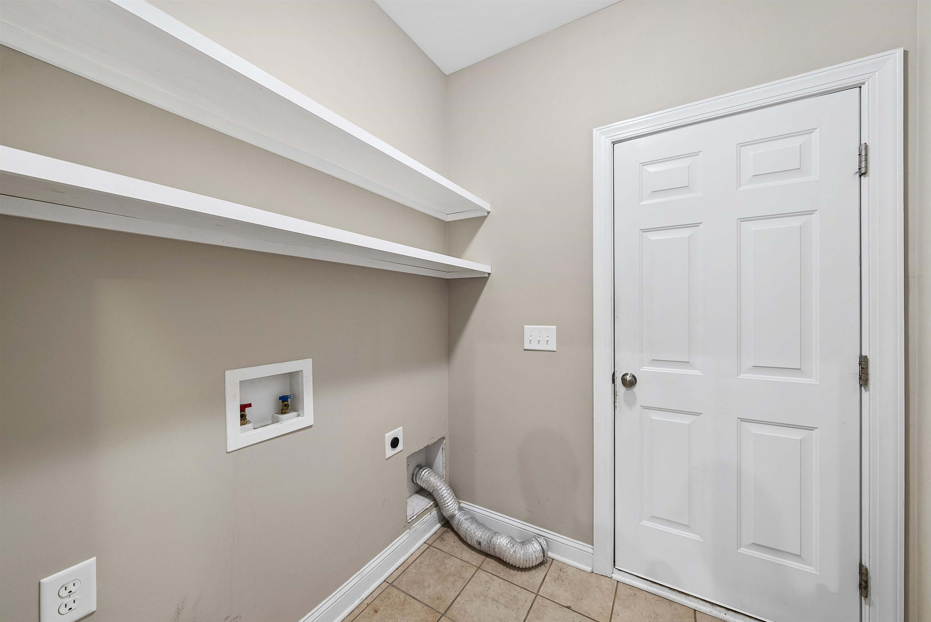 135 Rawhide Drive Spring Hope, NC 27882 - Photo 19 of 34 a view of small space with racks on the wall