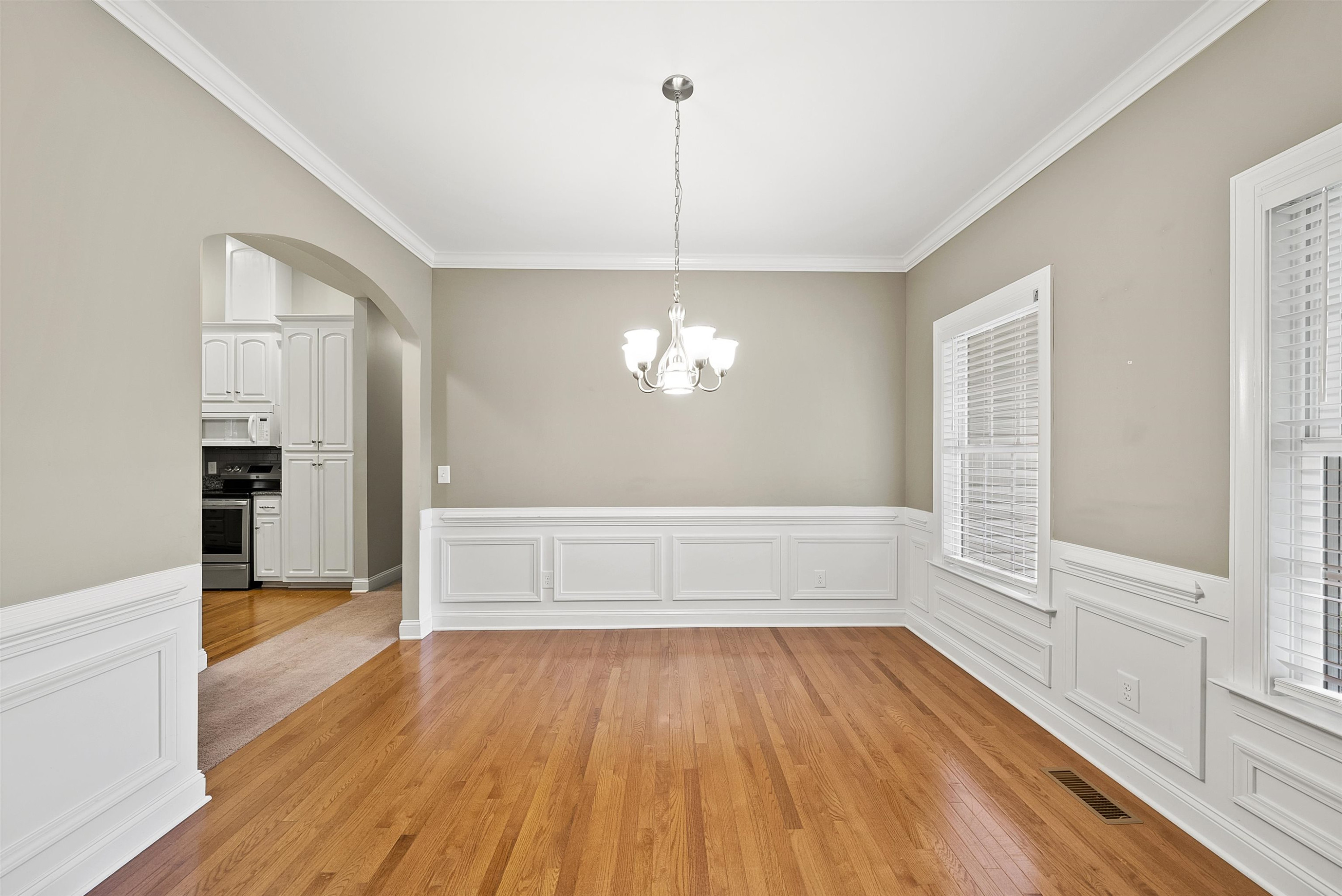 135 Rawhide Drive Spring Hope, NC 27882 - Photo 5 of 34 a view of empty room with wooden floor and fan