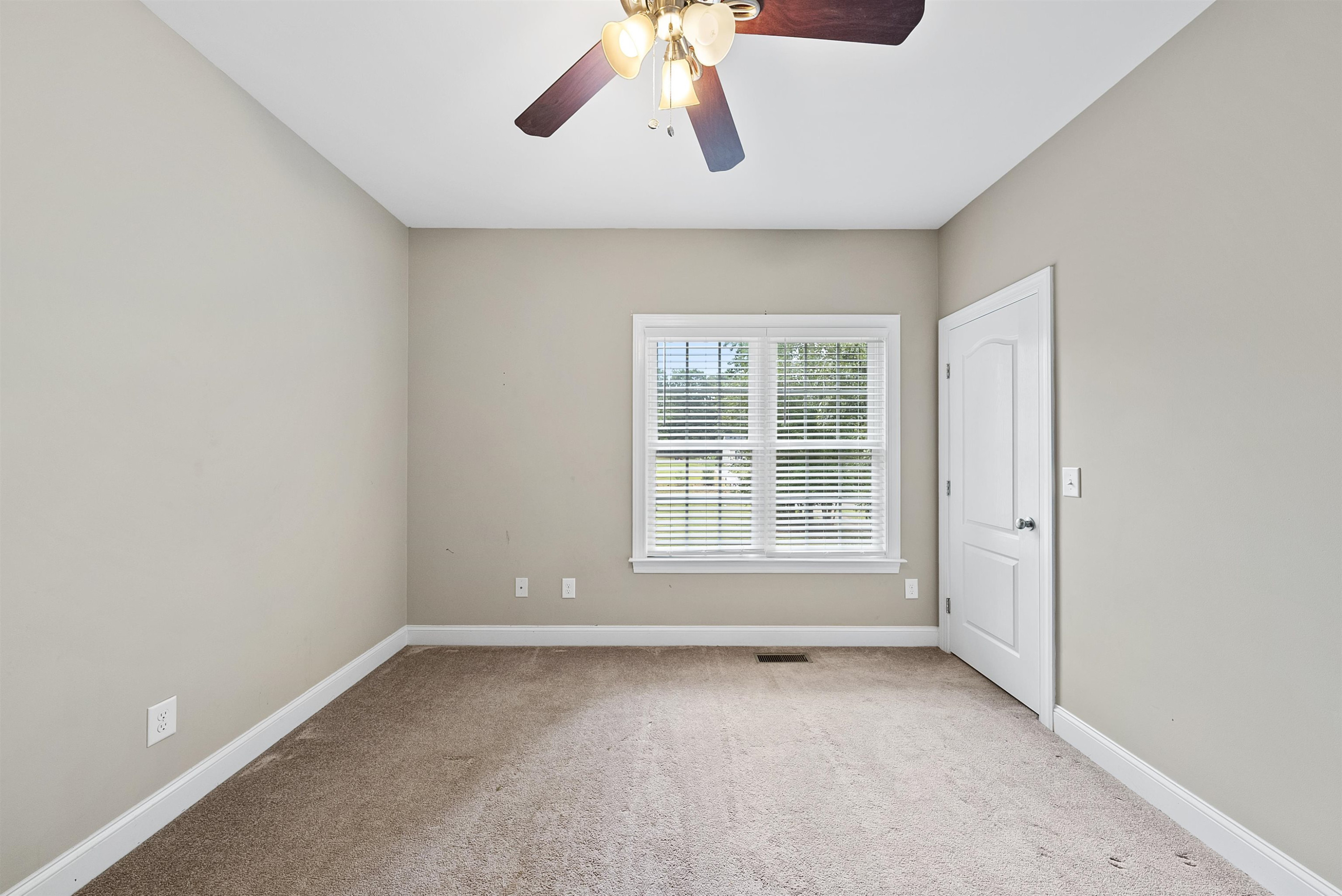 135 Rawhide Drive Spring Hope, NC 27882 - Photo 8 of 34 an empty room with a window