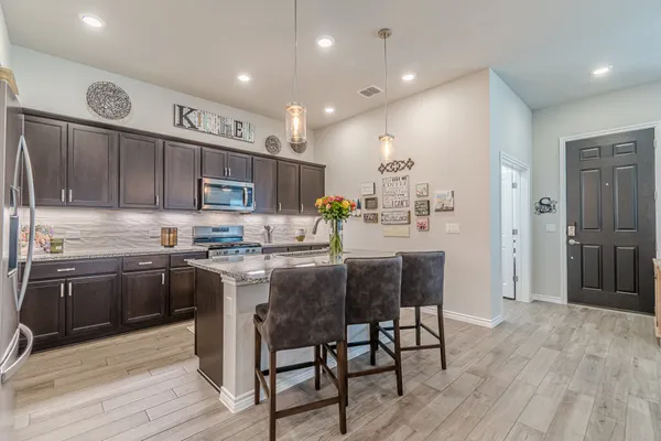 $384,500 | 138 Harborside Drive, Unit 101, San Marcos, TX 78666
