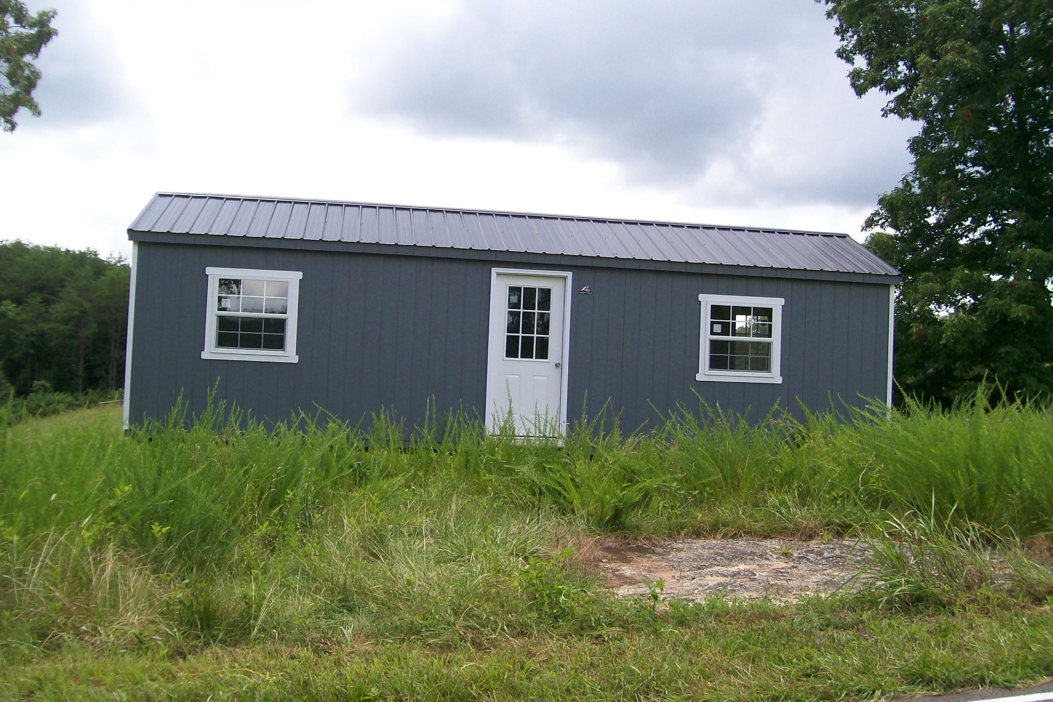0 Sparkman Town Road Rock Island, TN 38581 - Photo 11 of 13 a front view of house with yard and green space