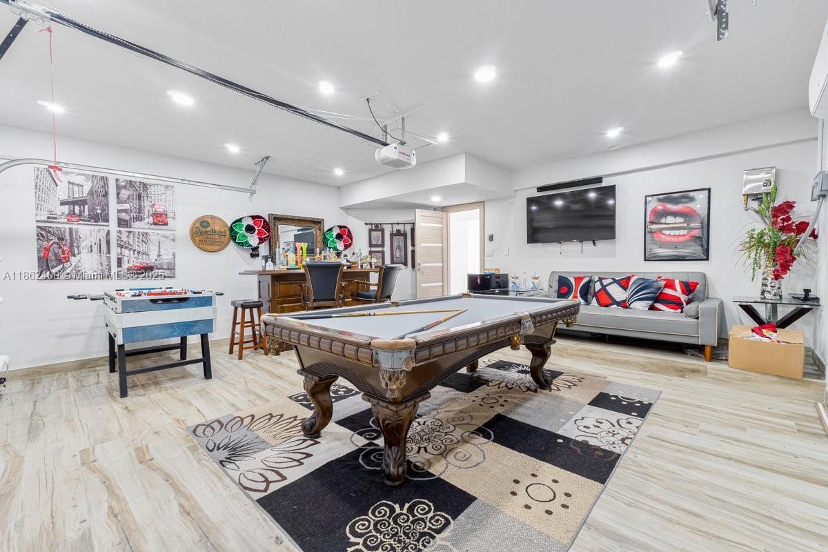9035 Southwest 156th Court Miami, FL 33196 - Photo 13 of 33 a living room with furniture and a flat screen tv