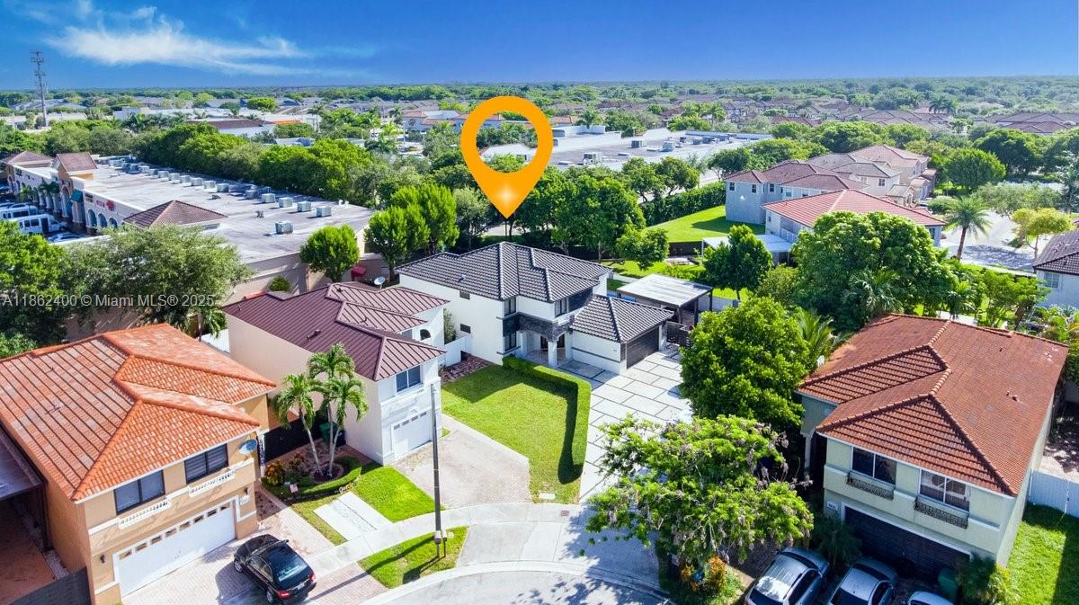 9035 Southwest 156th Court Miami, FL 33196 - Photo 3 of 33 an aerial view of a house with a garden