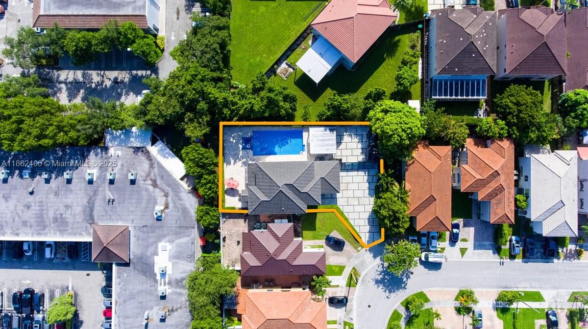 9035 Southwest 156th Court Miami, FL 33196 - Photo 4 of 33 an aerial view of multiple houses with swimming pool