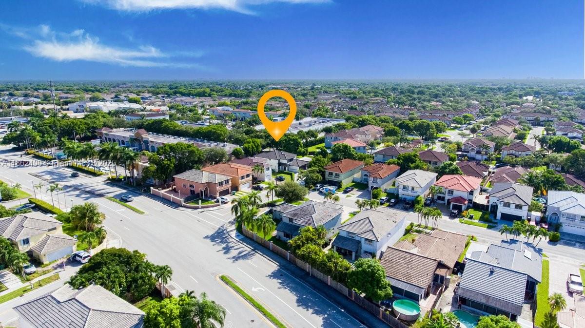 9035 Southwest 156th Court Miami, FL 33196 - Photo 5 of 33 an aerial view of a house with a swimming pool