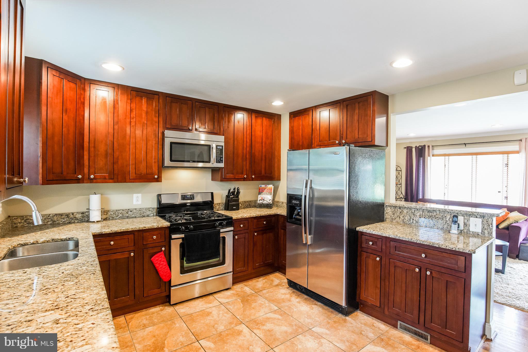 6918 Elbrook Road Hyattsville, MD 20784 - Photo 6 of 30 Kitchen w/42" cabinets, granite, SS Appliances
