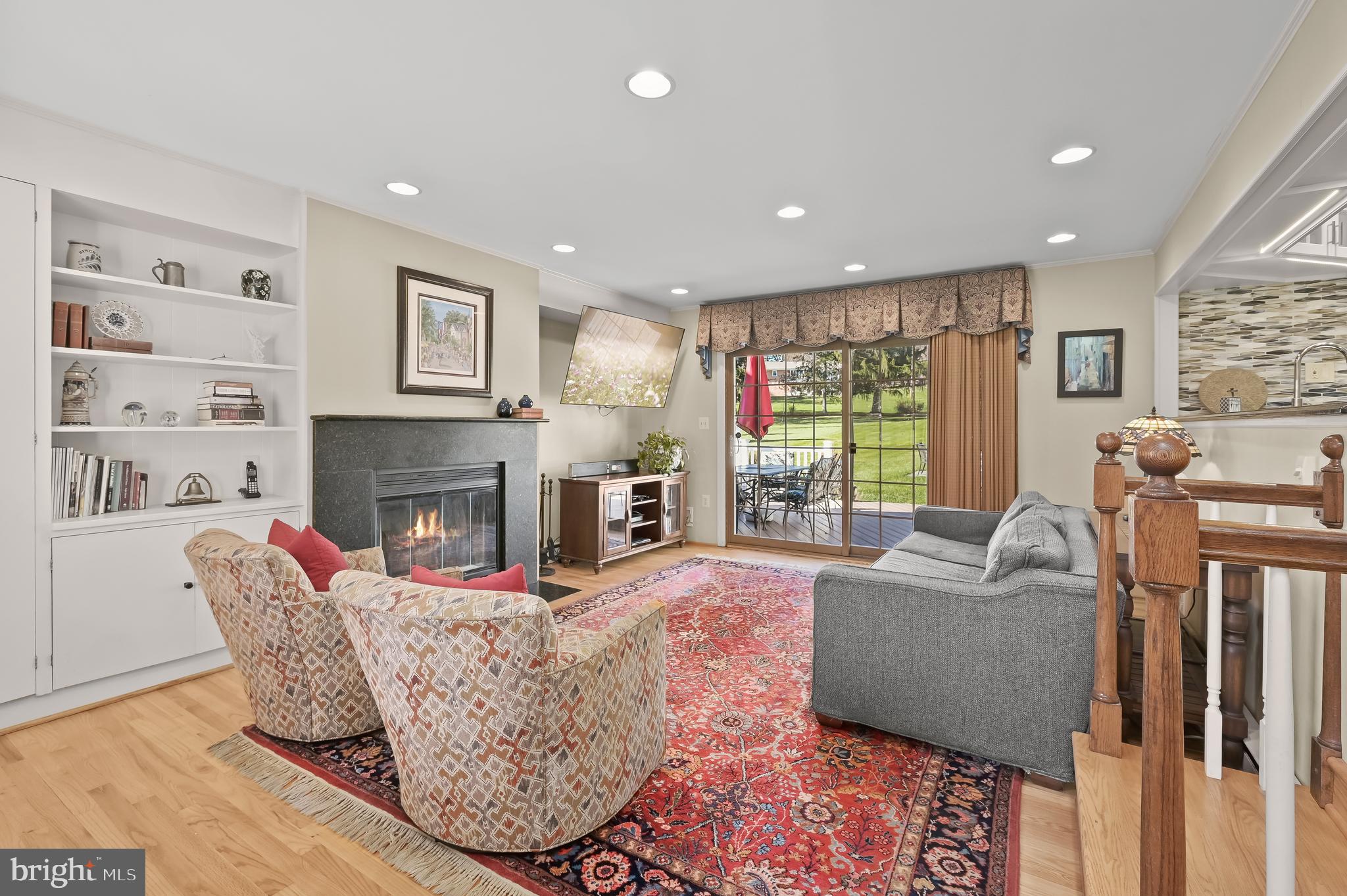 4014 Macalpine Road Ellicott City, MD 21042 - Photo 3 of 79 Family room with WB fireplace & backyard access