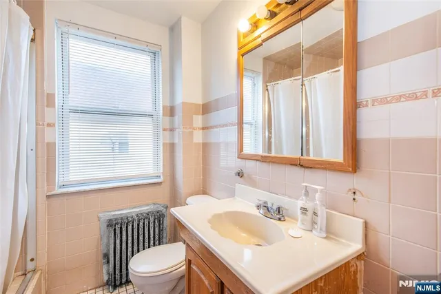 a bathroom with a sink and a toilet