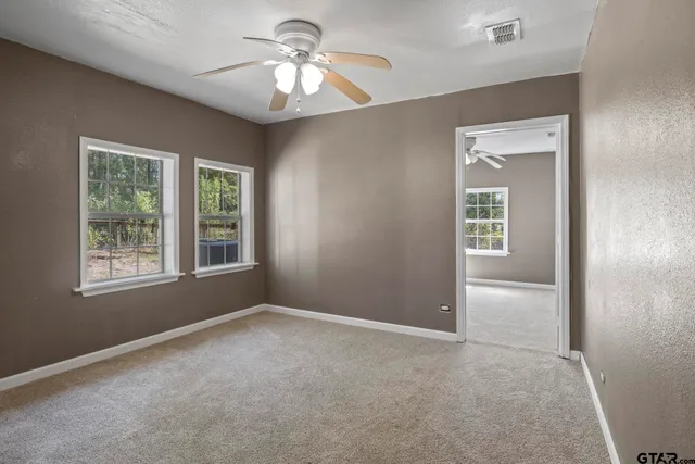 a view of empty room with a window