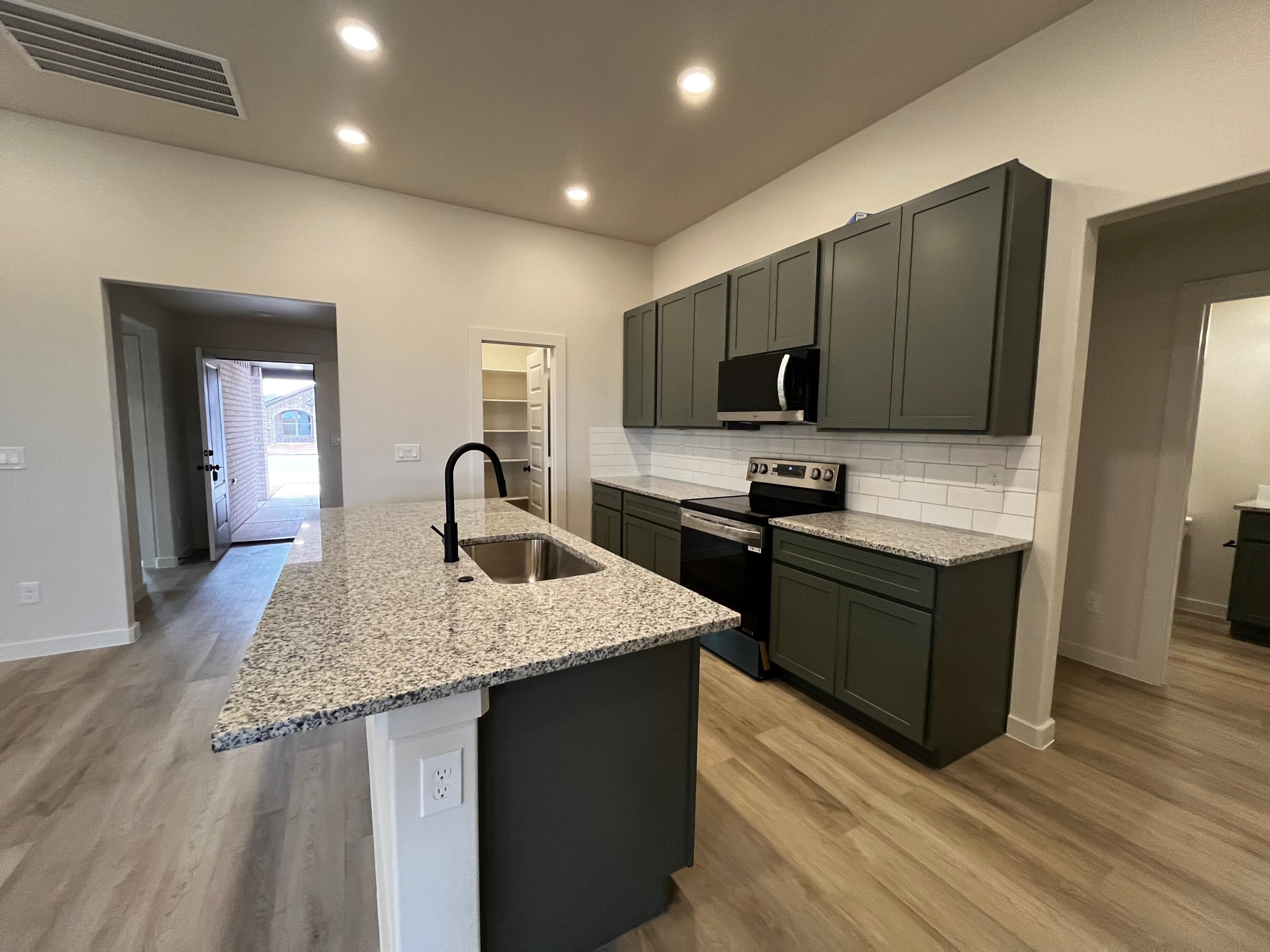 2016 Cottonwood Avenue Wolfforth, TX 79382 - Photo 4 of 16 IMG_2076