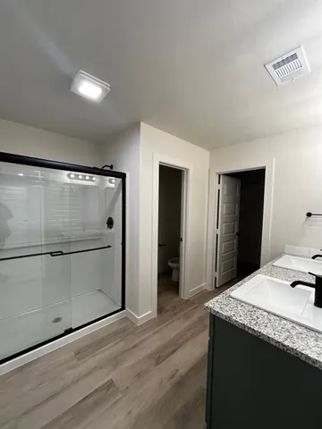 a kitchen with a refrigerator and countertop