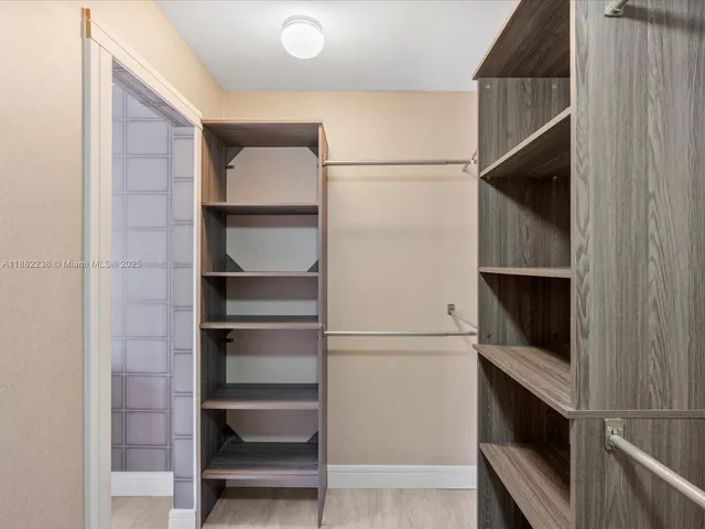 a view of an empty walk in closet