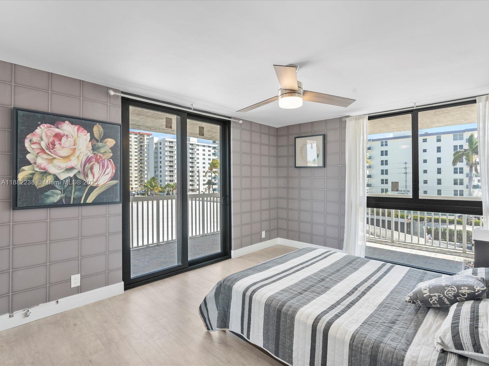 1500 South Ocean Drive, Unit 3G Hollywood, FL 33019 - Photo 23 of 37 a bedroom with a bed and a painting on the wall