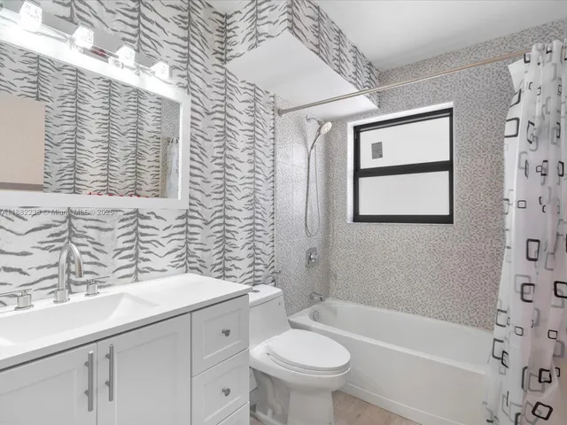 a bathroom with a sink and a bathtub