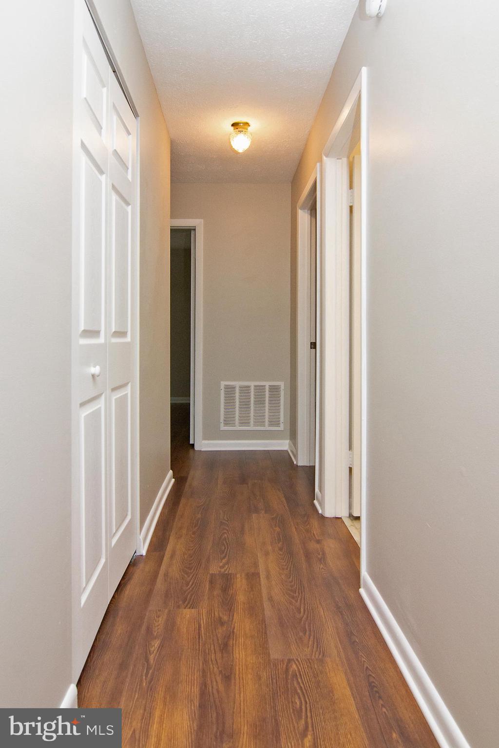 1526 Manchester Road Westminster, MD 21157 - Photo 13 of 41 a view of a hallway with wooden floor