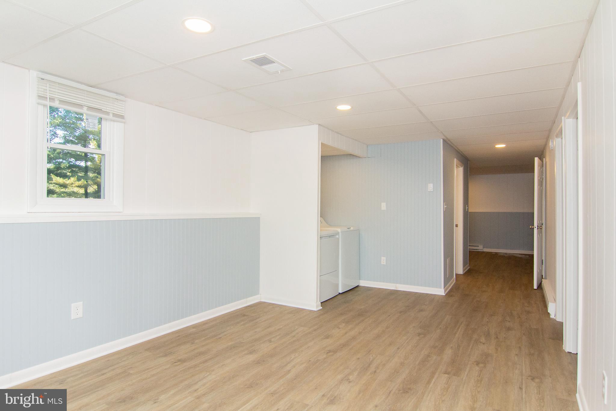 1526 Manchester Road Westminster, MD 21157 - Photo 26 of 41 wooden floor in an empty room with a window