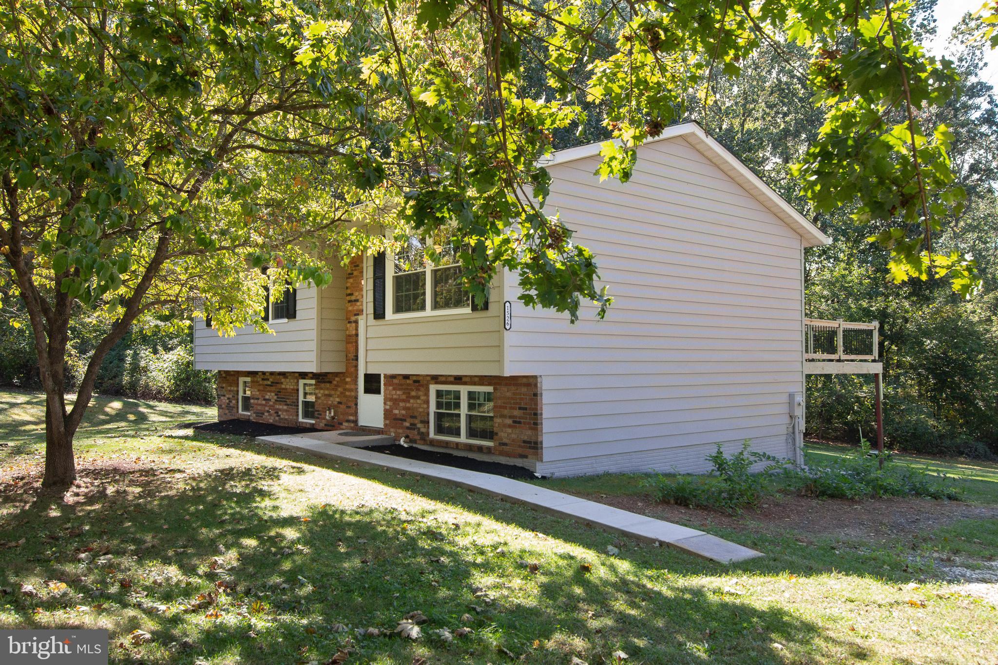 1526 Manchester Road Westminster, MD 21157 - Photo 31 of 41 a view of a house with a yard