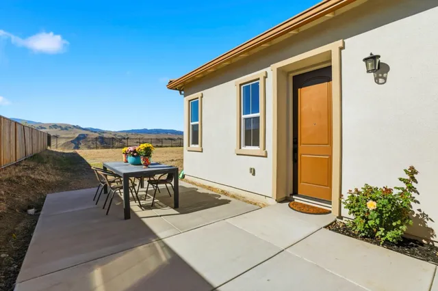 a view of a swimming pool with a lounge chair