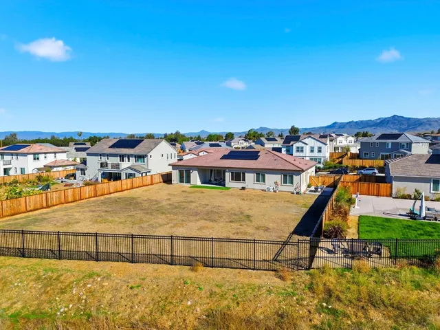 a front view of a house with ocean view