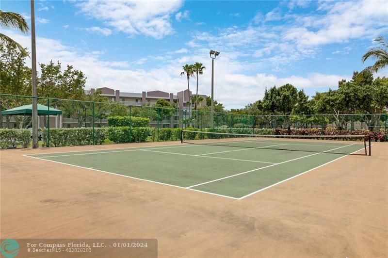 9525 Weldon Circle, Unit H110 Tamarac, FL 33321 - Photo 20 of 20 a view of a tennis court