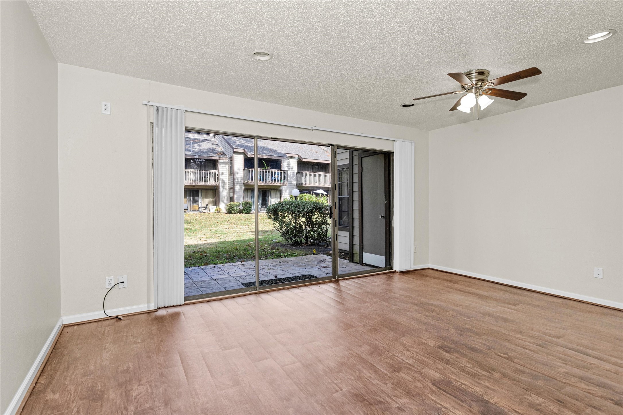 12900 Walden Road, Unit 513 Montgomery, TX 77356 - Photo 7 of 20 a view of an empty room with a window