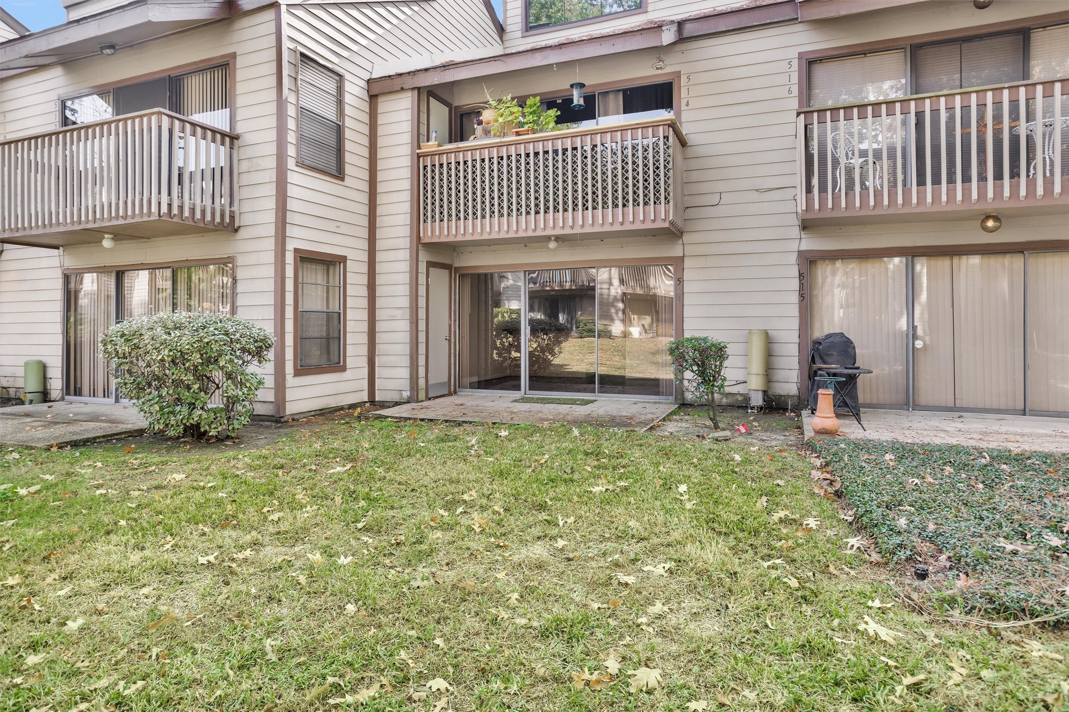 12900 Walden Road, Unit 513 Montgomery, TX 77356 - Photo 10 of 20 a front view of a house with garden