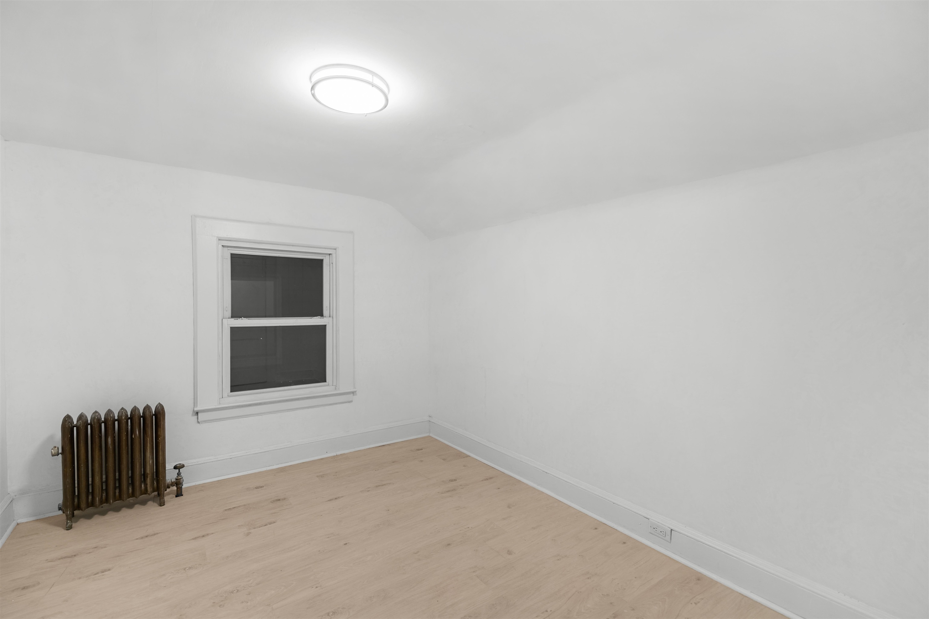 616 Chestnut Street, Unit 2 Kearny, NJ 07032 - Photo 13 of 21 a view of an empty room with a window