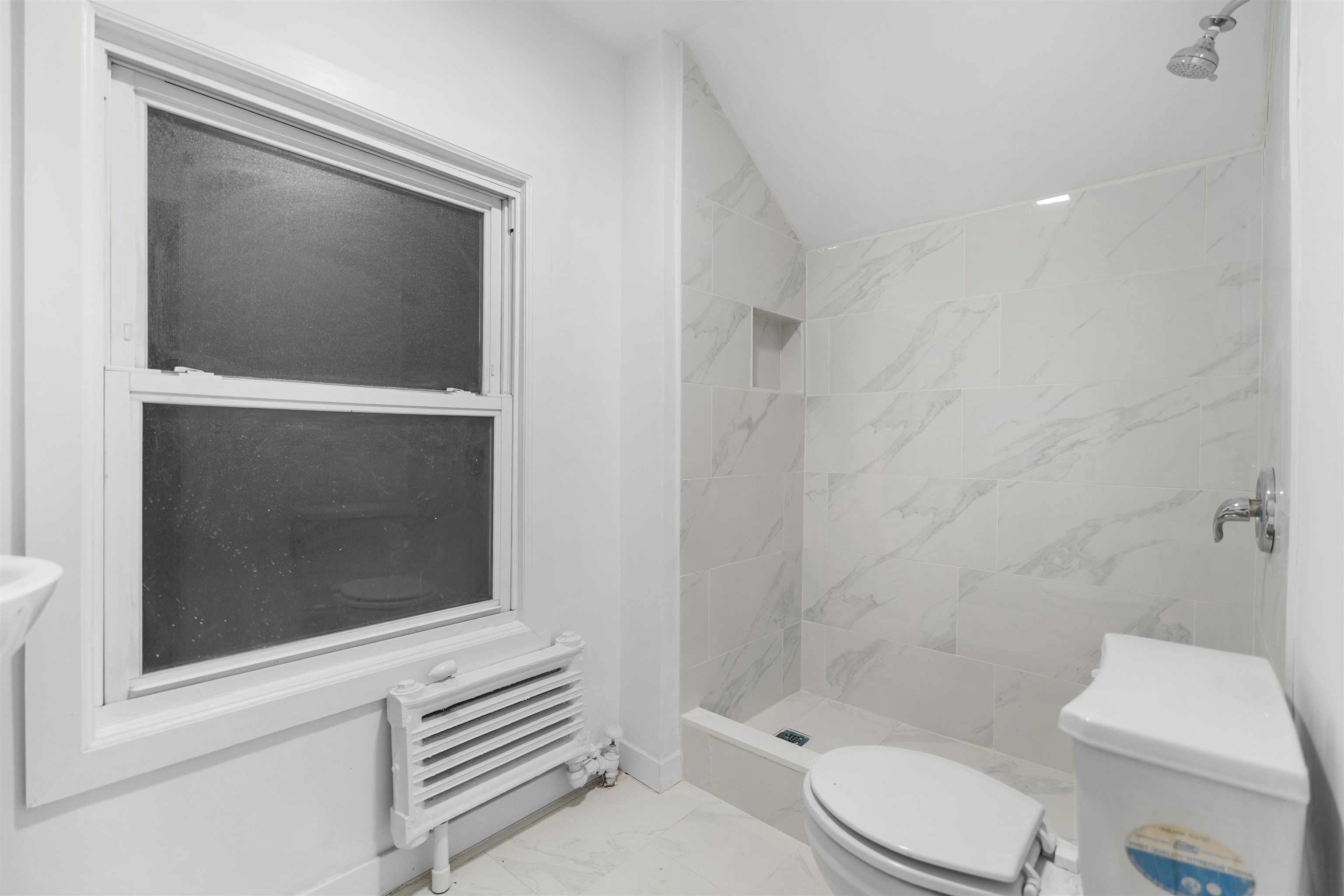 616 Chestnut Street, Unit 2 Kearny, NJ 07032 - Photo 17 of 21 a bathroom with a toilet a sink and shower