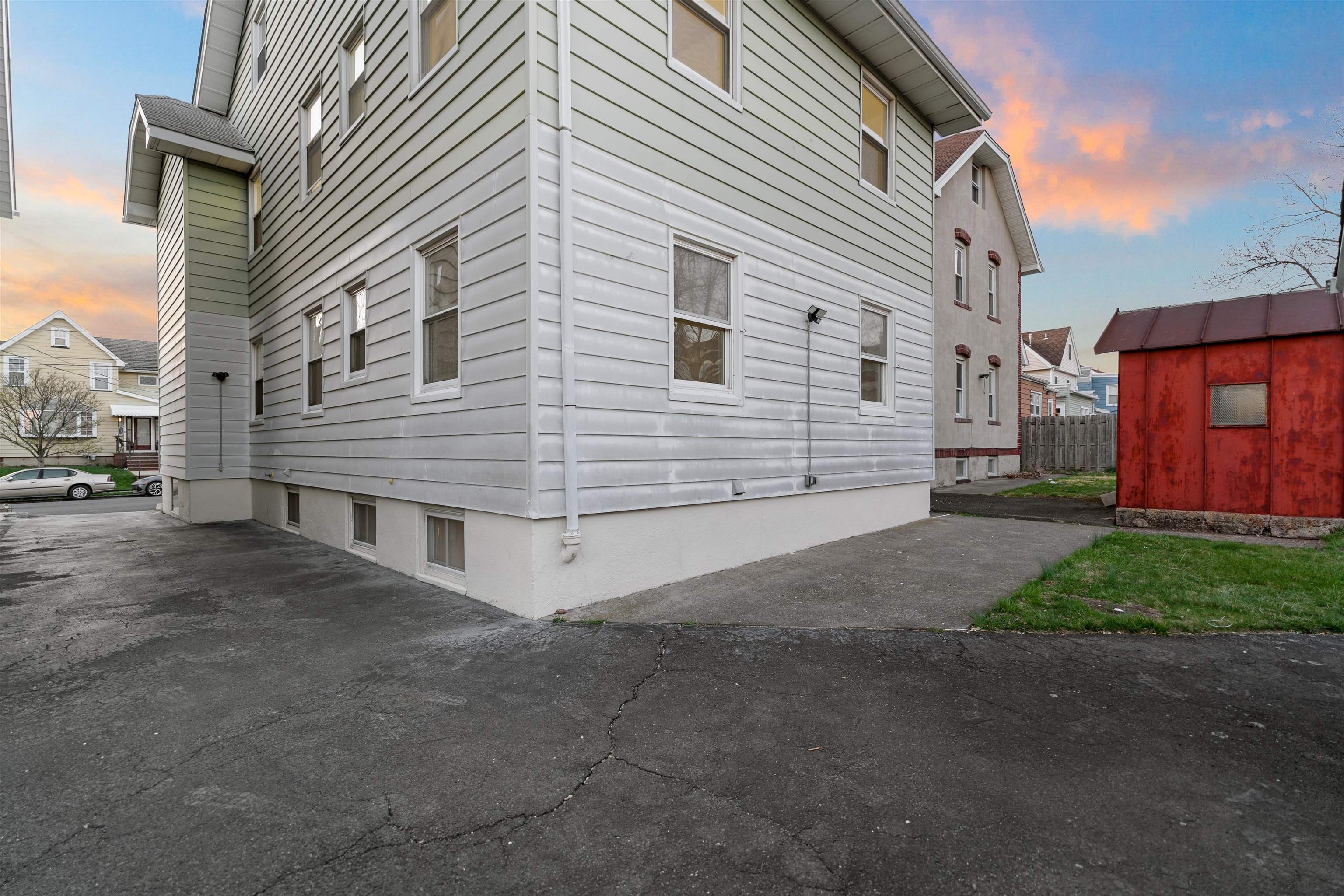 616 Chestnut Street, Unit 2 Kearny, NJ 07032 - Photo 19 of 21 a view of a house with a yard