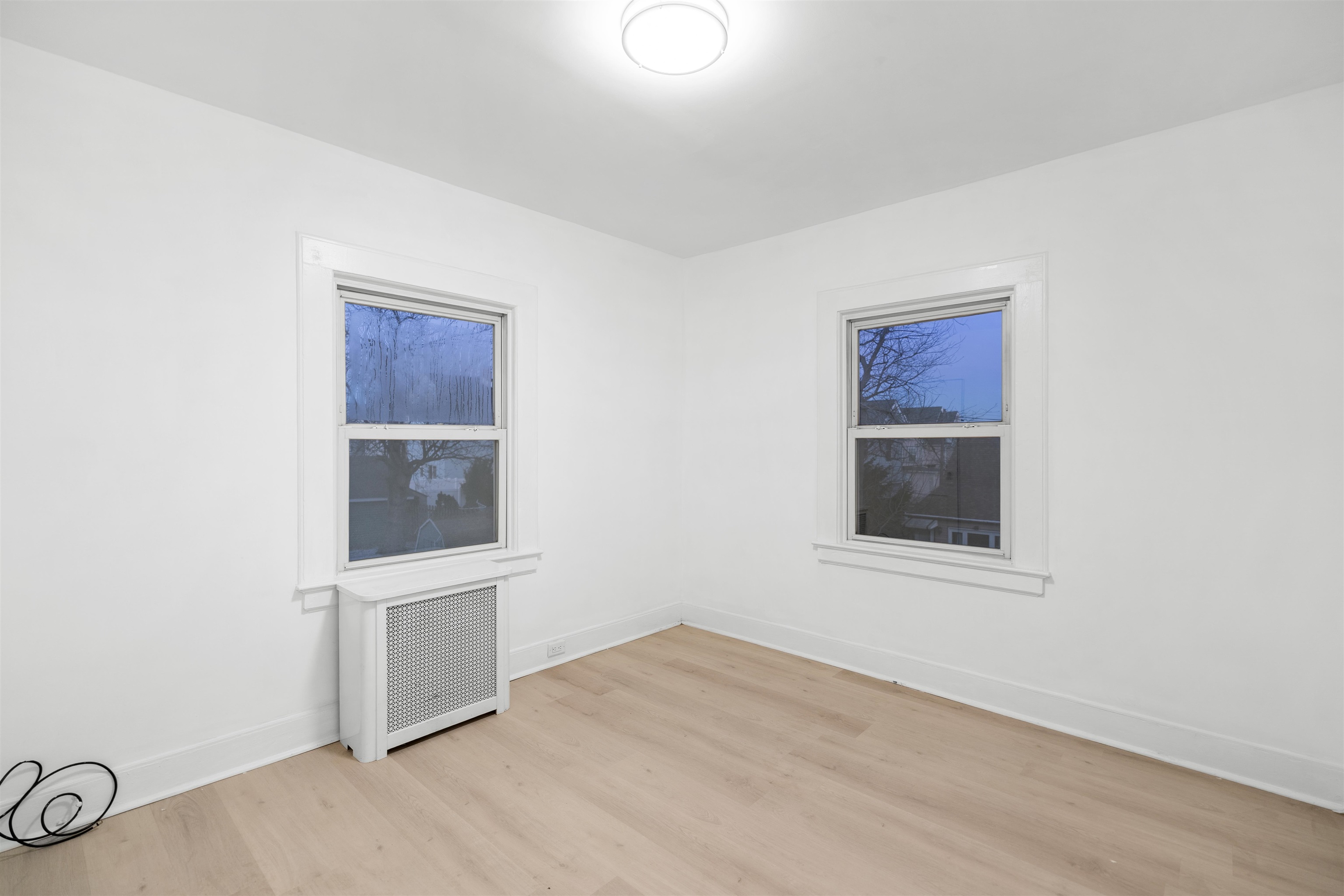 616 Chestnut Street, Unit 2 Kearny, NJ 07032 - Photo 9 of 21 an empty room with windows