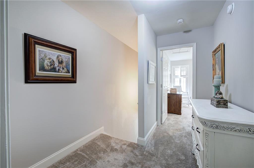 618 Manor Way Cartersville, GA 30120 - Photo 16 of 35 a room with a mirror and a sink