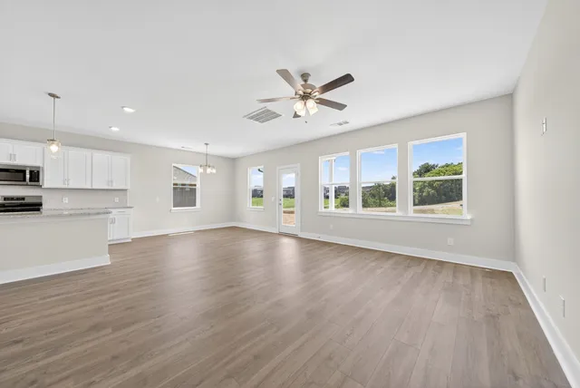 an empty room with windows