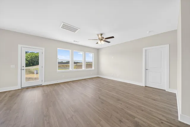 an empty room with windows