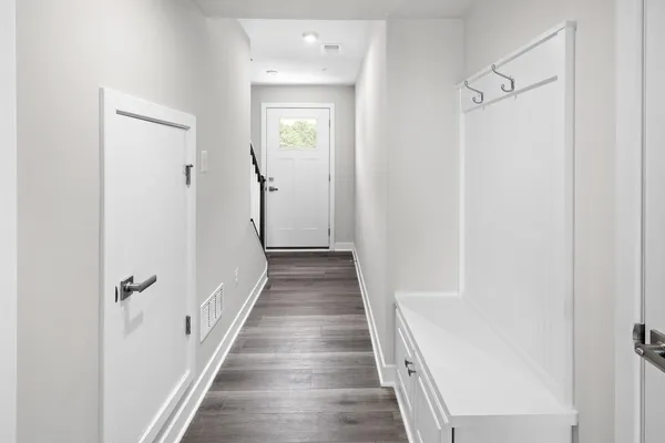 a view of a bathroom from the hallway