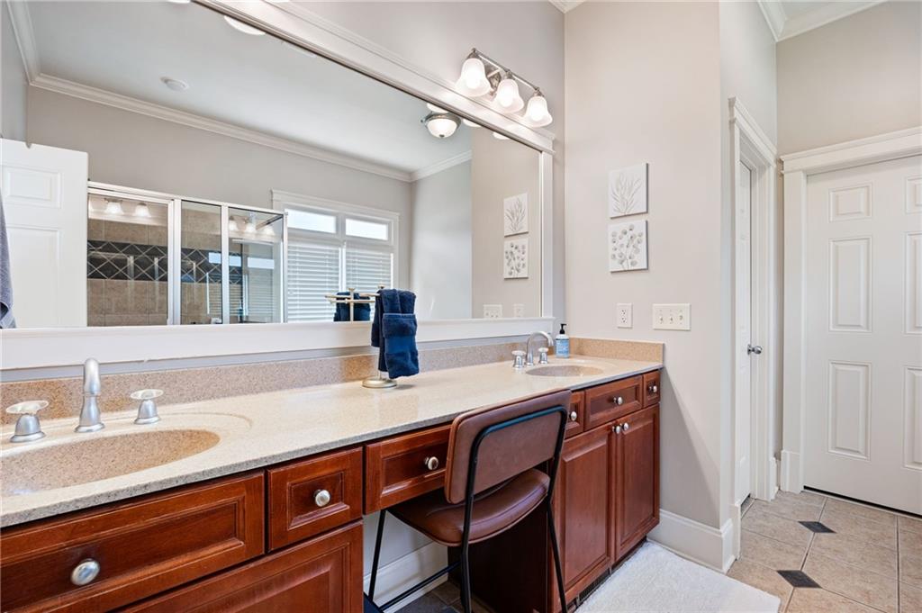 237 Highcrest Drive Acworth, GA 30101 - Photo 28 of 57 a bathroom with a sink double vanity granite and a mirror