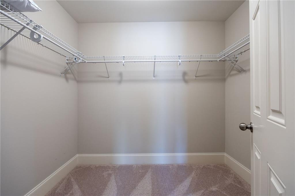 237 Highcrest Drive Acworth, GA 30101 - Photo 43 of 57 a view of a room with racks on the wall