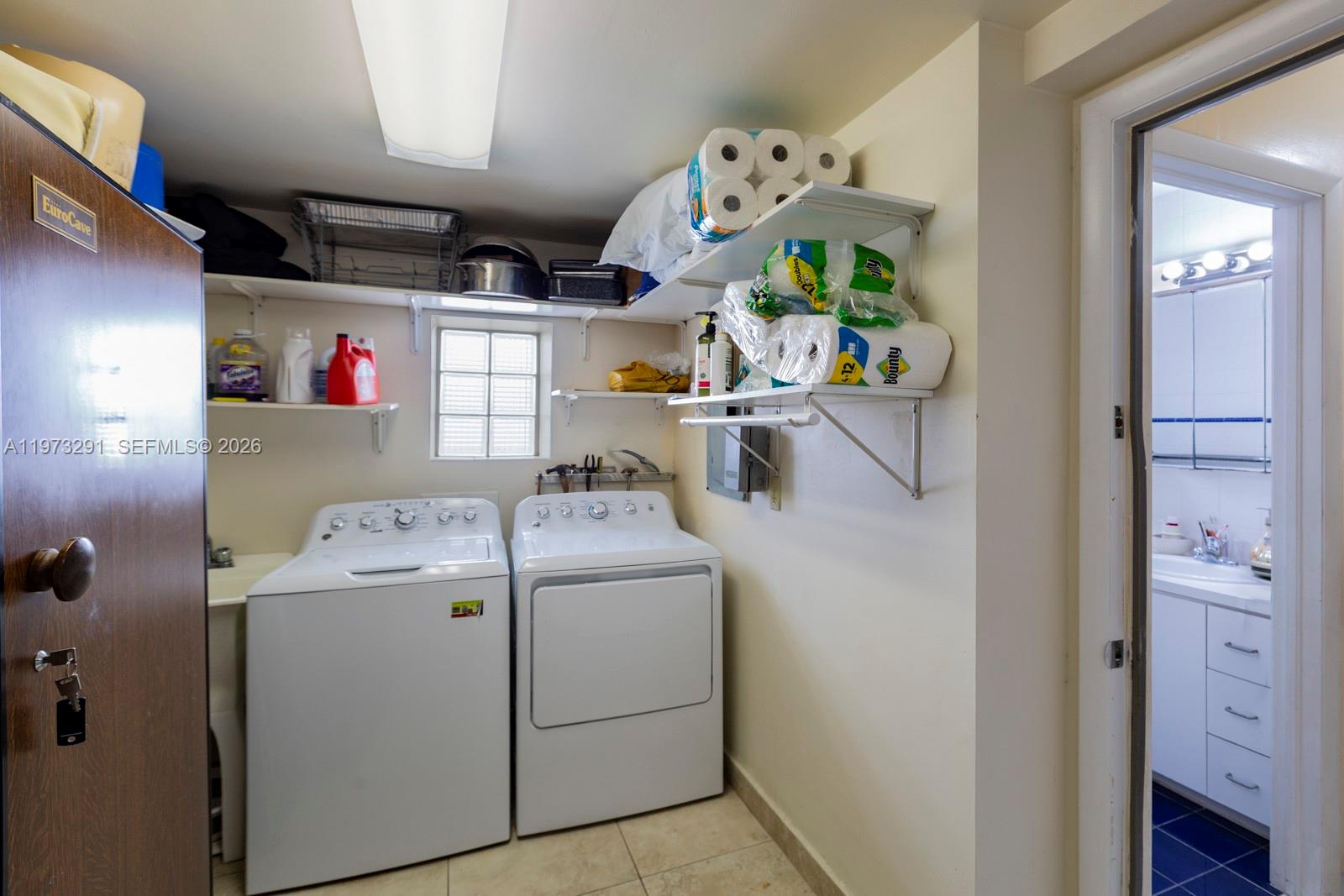 3721 Southwest 58th Avenue Miami, FL 33155 - Photo 23 of 23 a utility room with dryer and washer