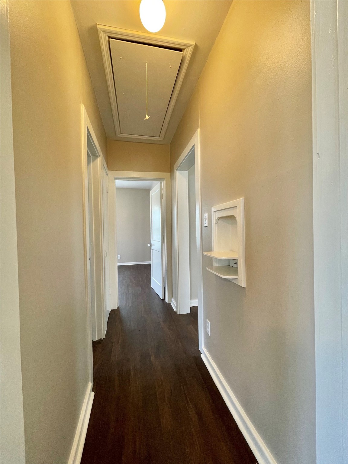813 Nursery Street Clute, TX 77531 - Photo 13 of 24 a view of a hallway with wooden floor and closet