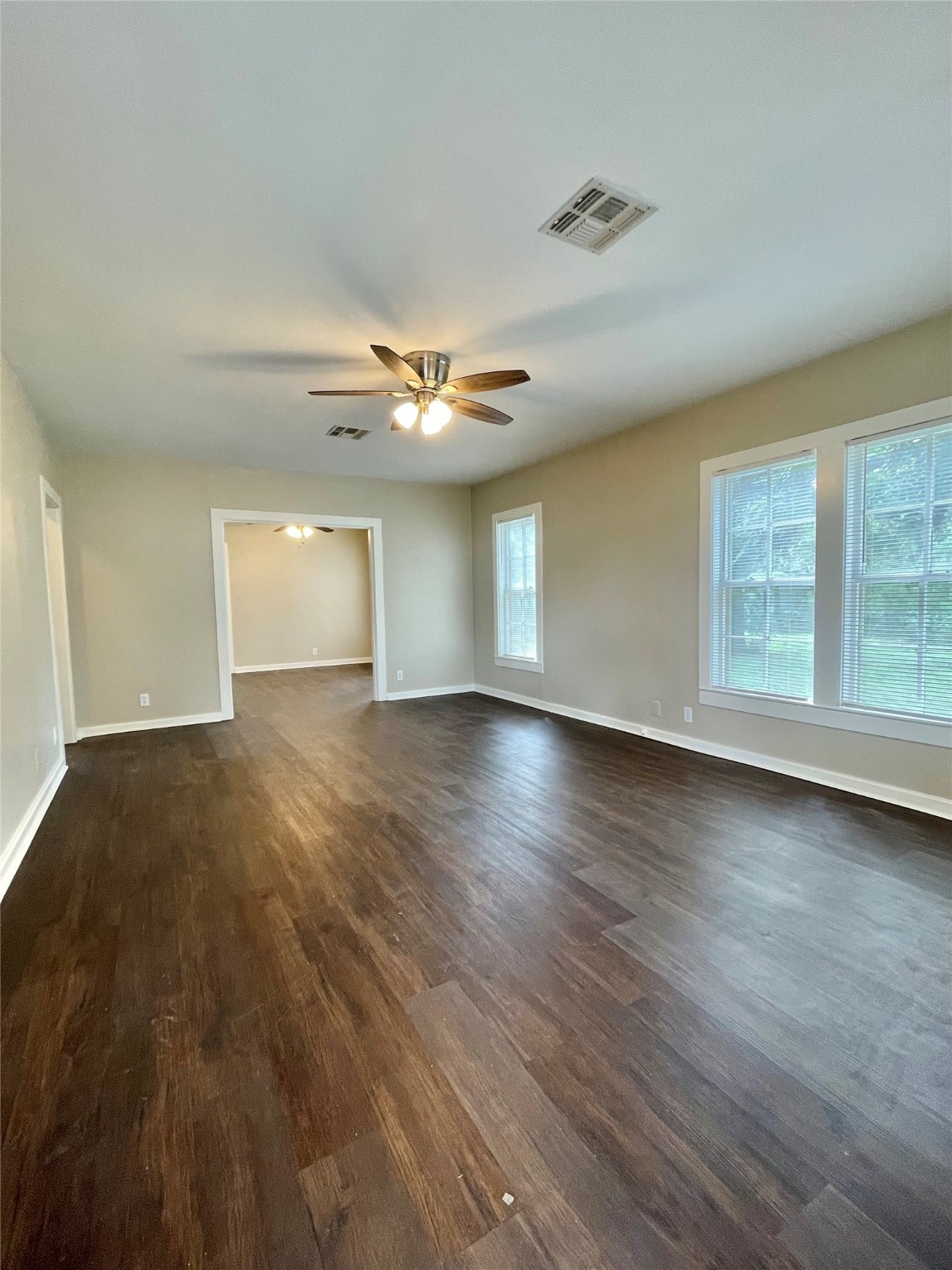 813 Nursery Street Clute, TX 77531 - Photo 20 of 24 wooden floor in an empty room with a window