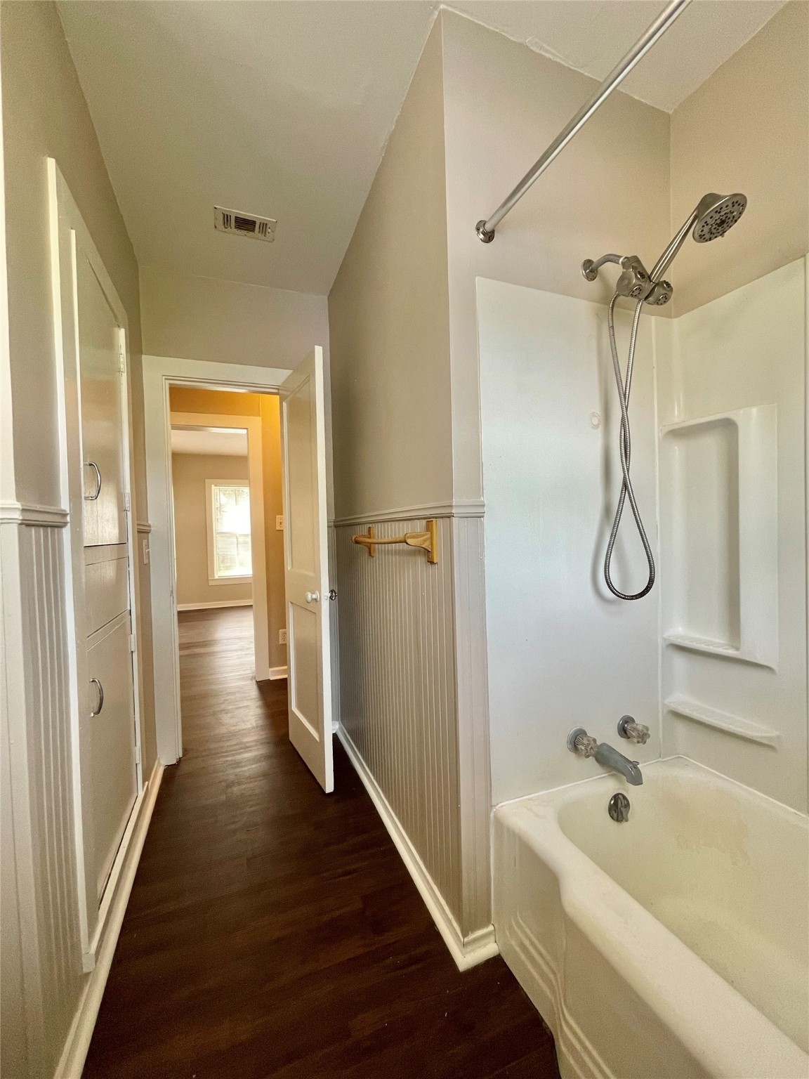 813 Nursery Street Clute, TX 77531 - Photo 10 of 24 a bathroom with a tub shower and sink