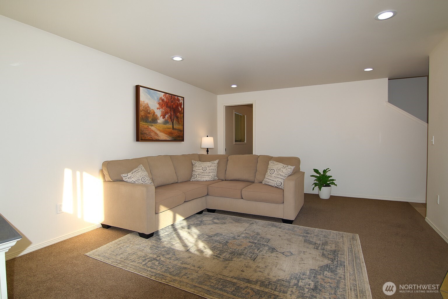 526 Monarch Street Moses Lake, WA 98837 - Photo 23 of 38 a living room with furniture and a couch