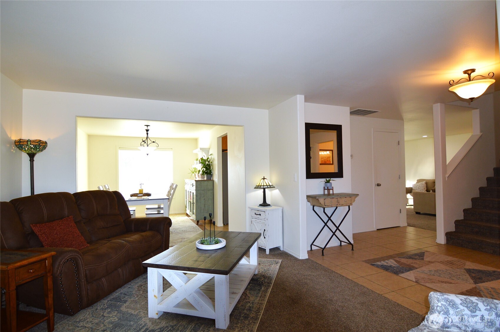 526 Monarch Street Moses Lake, WA 98837 - Photo 24 of 38 a living room with furniture and a large window