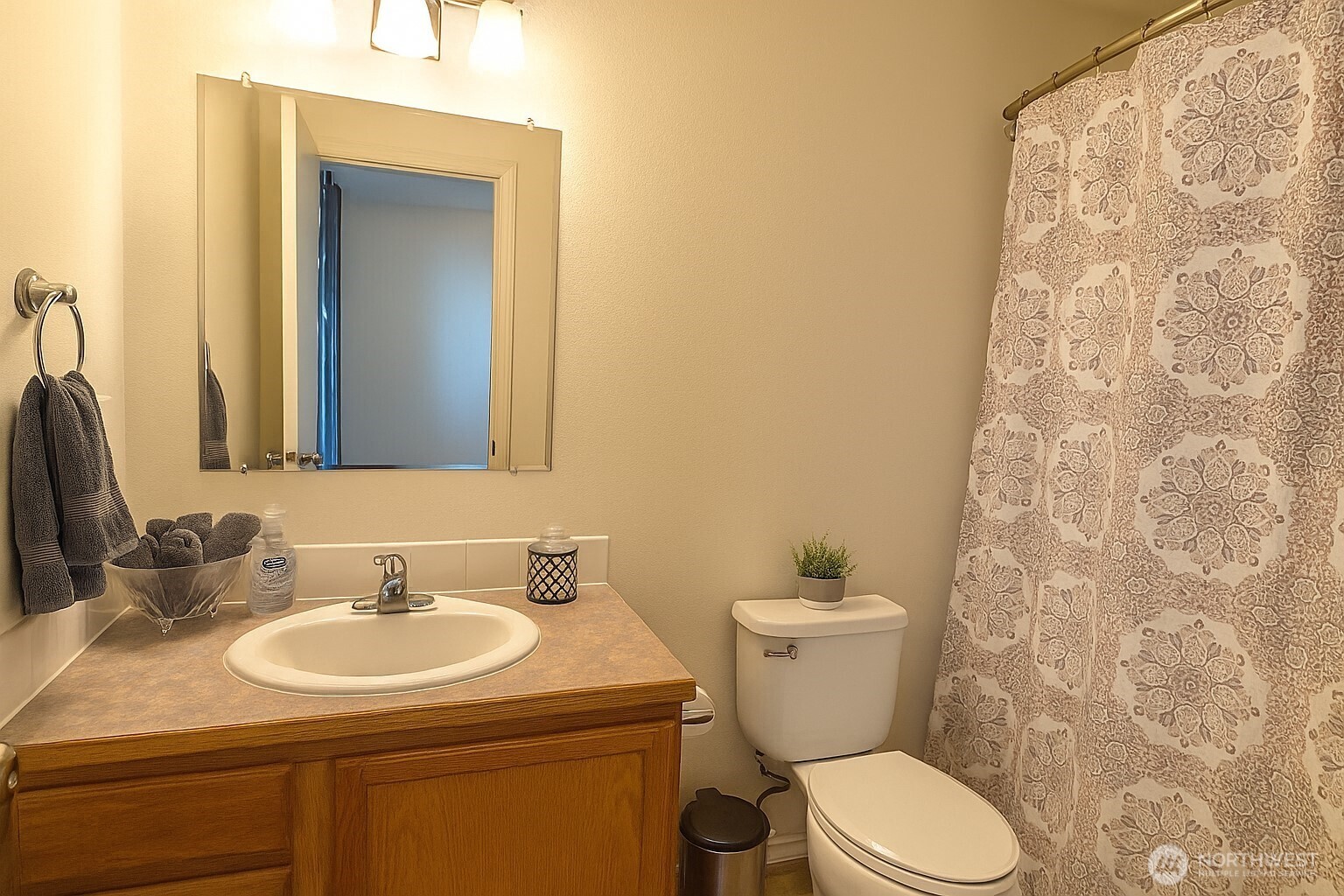 526 Monarch Street Moses Lake, WA 98837 - Photo 27 of 38 a bathroom with a sink and a toilet