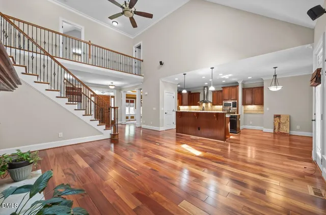 a view of a living room and kitchen with furniture and a kitchen view